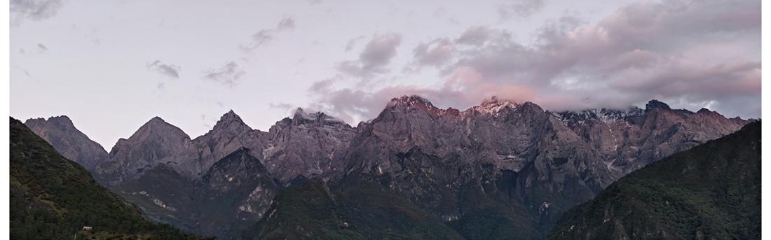 The Jade Dragon range turning purple at dusk